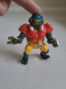 Leonardo T.D. 1991 Figura de fútbol americano Tossin' Leo Teenage Mutant Ninja Turtles  - Imagen 1 de 6