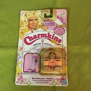 Charmkins Schmuck Playmates Rosie Waschbär Strumpfband Strumpfband Neu in Verpackung 1984 - Bild 1 von 4
