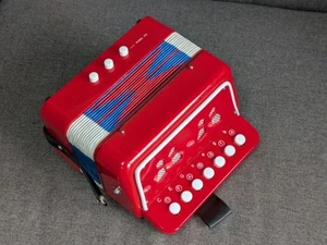 Mini acordeón rojo Schylling juguete de instrumento musical para niños excelente - Imagen 1 de 6