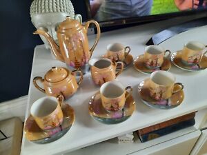 A Vintage 20thC Japanese Eggshell Porcelain 17 Piece Coffee Service Hand Painted
