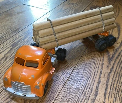 Vintage Hubley 500 Series Logging Truck Tractor Trailer Orange With Logs - Image 1 of 4