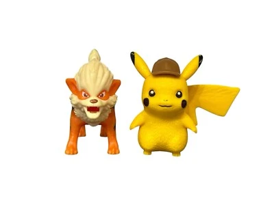 Dos juguetes de detective Pikachu Pokémon Burger King: ilumina Pikachu y Arcanino Foto 1 de 4