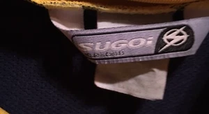 Sugoi Bicycle Cycling Zip Shirt Size Large Blue & Yellow with 2 Pockets in Back - Picture 1 of 6
