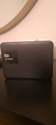 Western Digital easystore 4TB External USB 3.0 Portable Hard Drive WDBKUZ0040BBK - Image 1 of 4