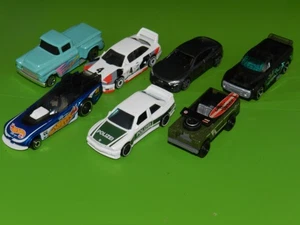 Hot Wheels  -  7 verschiedene Modelle ohne OVP   -  Konvolut 1 - Bild 1 von 4
