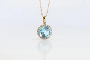 14k Blue Topaz and diamond halo pendant. 14k swiss blue topaz pendant necklace. - Picture 1 of 4