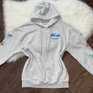 Die Schlümpfe Damen Large hellgrau Langarm Grafikdruck Hoodie Sweatshirt - Bild 1 von 14