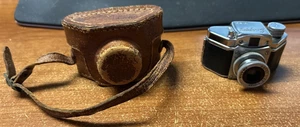 Cámara espía miniatura Konica Snappy de colección con estuche de cuero funciona Konishiroku - Imagen 1 de 5