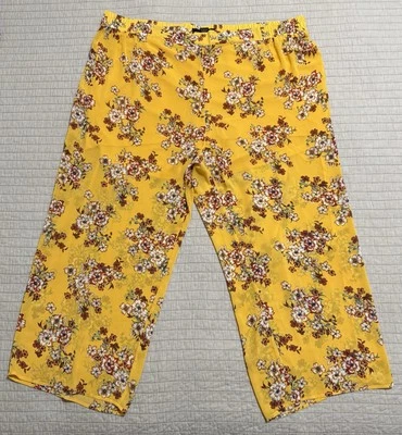 Легкие шифоновые брюки без застежек с широкими штанинами Torrid желтые с цветочным рисунком большого размера 3 - Изображение 1 из 4