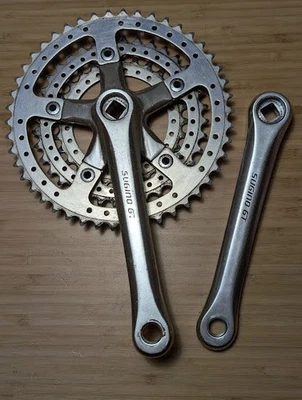 SUGINO GT 175mm crankset 48/36/28 Drilled rings SUGINO bolts Made in Japan VGC Foto 1 de 4