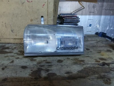 OLDSMOBILE 98 MONTAJE FAROS LADO CONDUCTOR OEM 1991-1993 Foto 1 de 4