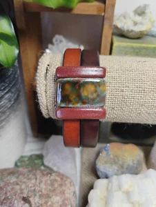 Two-toned Leather Cuff Bracelet With Ceramic Beads And Magnetic Closure - Picture 1 of 3