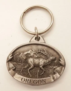 Llavero de recuerdo de alce de Oregón de colección color peltre c.1984 Siskiyou Buckle Co. - Imagen 1 de 2