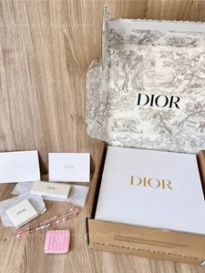 Accessoire téléphone fidget rose Dior Octobuddy + sangle + boîte cadeau galet + carte cadeau - Photo 1 sur 10