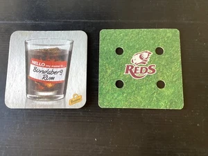 2 different Bundaberg Rum Distillery 1970,s Issued Coasters NEW condition - Picture 1 of 2