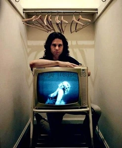 Jim Morrison in Closet with TV The Doors Photo Print Poster - Picture 1 of 1