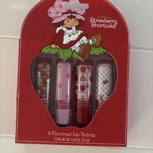 Set Balsamo Labbra Fragola Shortcake - 4 Pezzi Balsami Labbra Aromatizzati Nuovo - Foto 1 di 7