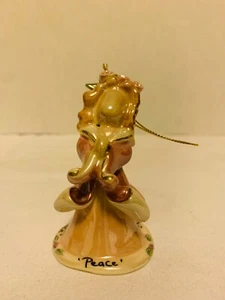 Blue Sky Heather Goldmine 2001 melocotón/verde azulado 'Paz' adorno de ángel SA20298 - Imagen 1 de 9