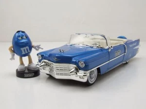 Cadillac Eldorado Convertible 1956 blu con personaggio M&Ms modellino auto 1:24 Jada Toys - Foto 1 di 9