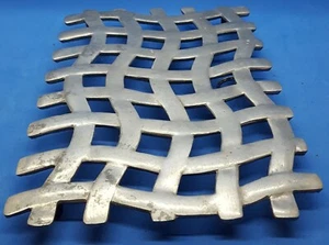 Vtg COPCO Polished Aluminum Cast Hot Trivet Table Saver Woven Look Hanger 7"x10" - Imagen 1 de 5