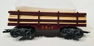 Marx 586 ERIE Maroon Flatcar - 8 Wheel - Lumber Load - Plastic Tilt Cplrs - Picture 1 of 12