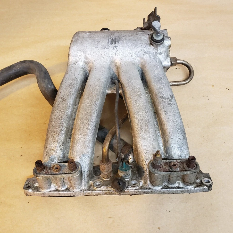 Colector de admisión de entrada original Saab 900 1981-1984 9307234 OEM Foto 1 de 4