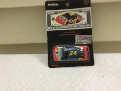 1997 Action Jeff Gordon #24 DuPontMillion Dollar 1/64 Black Window Car - Image 1 of 2