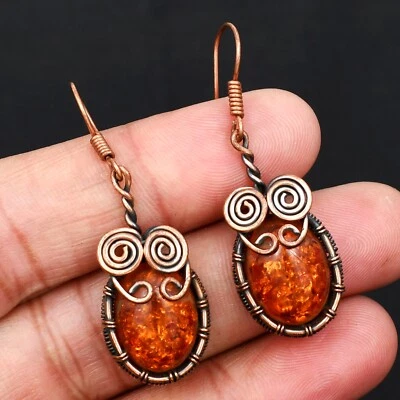 Pendientes colgantes envueltos en alambre de cobre hechos a mano con piedras preciosas de ámbar báltico SS-04 Foto 1 de 4
