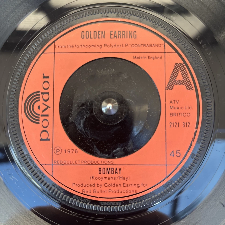 Golden Earring - Bombay 7” Single 2121-312 Polydor 1976 - Image 1 of 1