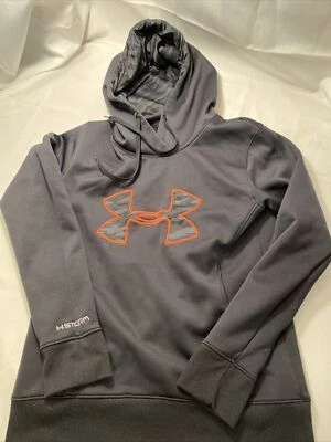 Sudadera con Capucha Under Armour Talla L Adolescente Calce Suelto Negra/Naranja Logo STORM Foto 1 de 4