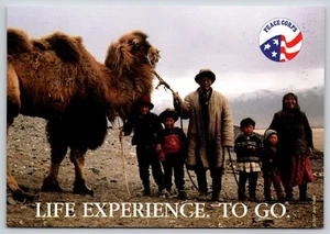 Postcard Peace Corps Ad Life Experience to Go Kyrgyzstan Family Bactrian Camel - Picture 1 of 2