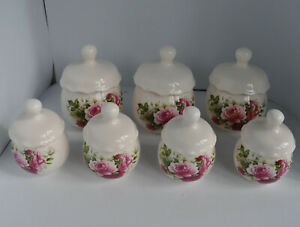 Set of 7 ceramic lidded pots. Floral. Pink roses Trinket. Fluted lids. 2 sizes