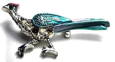 Prendedor/broche vintage tono plata esmalte azul verdoso estrás corredor de carretera escudo rojo Foto 1 de 4