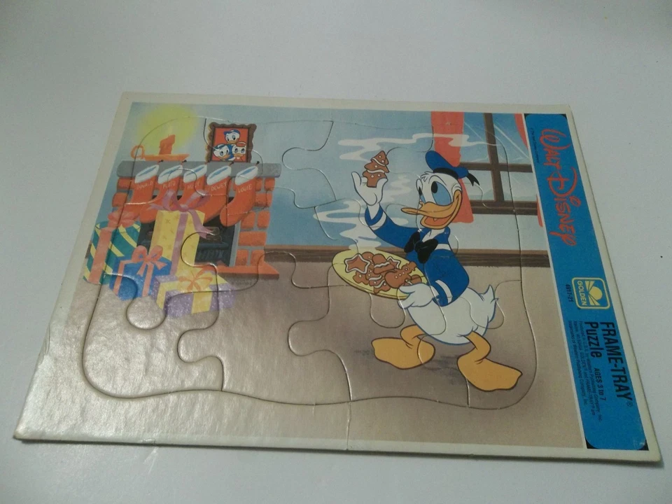 walt disney donald duck with fireplace & cookies 12 piece frame tray puzzle - Image 1 of 1