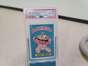 1985 Garbage Pail Kids Stickers 42b Muggin' Megan Sneak Award Glossy PSA 8