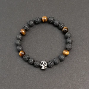 Bracciale uomo pietra lavica elasticizzato con occhio di tigre e acciaio inox perle teschio - Foto 1 di 1