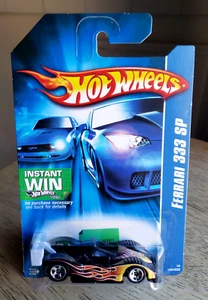 Ferrari 333 SP 2006 Hot Wheels Mainline #195/223 negro 1:64 cromo 5 radios J8025 - Imagen 1 de 11