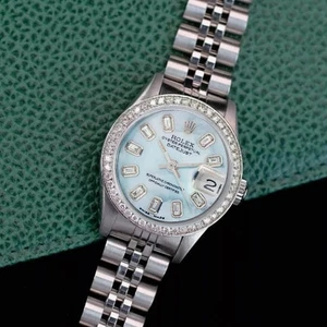 Rolex Datejust Ladies Stainless Steel Blue Mother of Pearl Baguette Watch 26mm - Picture 1 of 13