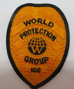 PATCH - WORLD PROTECTION GROUP 100 security badge shape - Picture 1 of 3