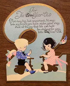 Tarjeta de felicitación de feliz cumpleaños troquelada vintage de los años 40 niño y niña jugando P3A - Imagen 1 de 17