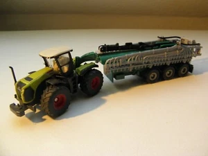 Siku Farmer 1827 Claas Xerion 5000 Traktor mit Samson Gülleauflieger 1/87 - Bild 1 von 6