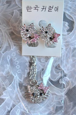 Hello Kitty Sanrio Rhinestone Post Earrings And Chain Necklace Set Pink Bow  - Image 1 of 4