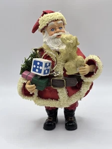 Possible Dreams Clothtique Weihnachtsmann Figur Geschenke Hund - Bild 1 von 6