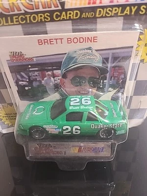 1991 Racing Champions | Brett Bodine #26 Quaker State carro de corrida fundido 1:64 - Imagem 1 de 3