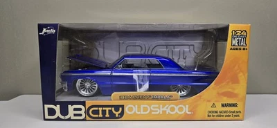 JADA DUB CITY OLD SKOOL 1:24 1964 CHEVY IMPALA LOWRIDER azul NUEVO EN CAJA Foto 1 de 4