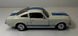 NUEVO RAY SHELBY GT 350 1966 BLANCO CON RAYAS AZULES Muscle Car. Escala 1:32 sin caja - Imagen 1 de 9