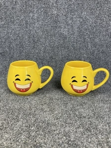 Set 2 tazze da tè caffè emoji viso ridente gialle usate in ottime condizioni - Foto 1 di 6