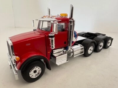 1:50 Red Peterbilt 367 Tri-Axle Day Cab Diecast Model By First Gear - Image 1 of 4