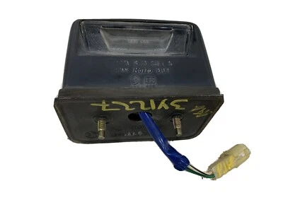 Toyota Camry Wagon 1987-1991 matrícula luz lámpara con protector OEM Foto 1 de 4