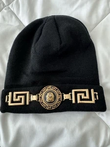NWT Aldo Black knit beanie gold lion medallion Greek key pattern accents - Picture 1 of 5